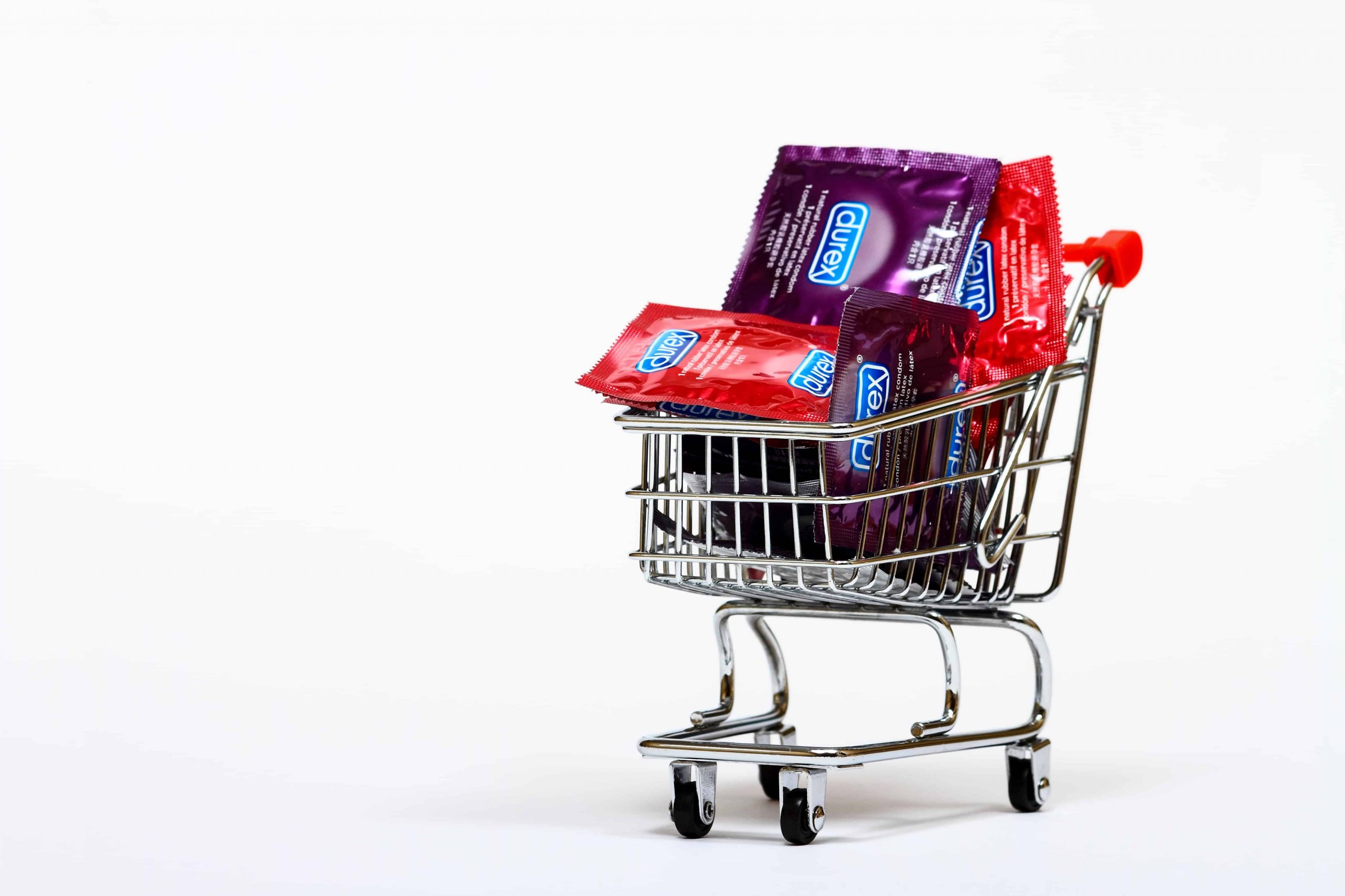 Shopping cart filled with condom packets