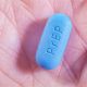 An outstretched hand with a Prep pill for HIV prevention
