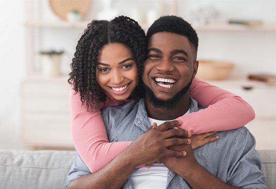 woman hugging man from behind