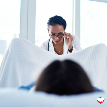 doctor examining woman's vagina