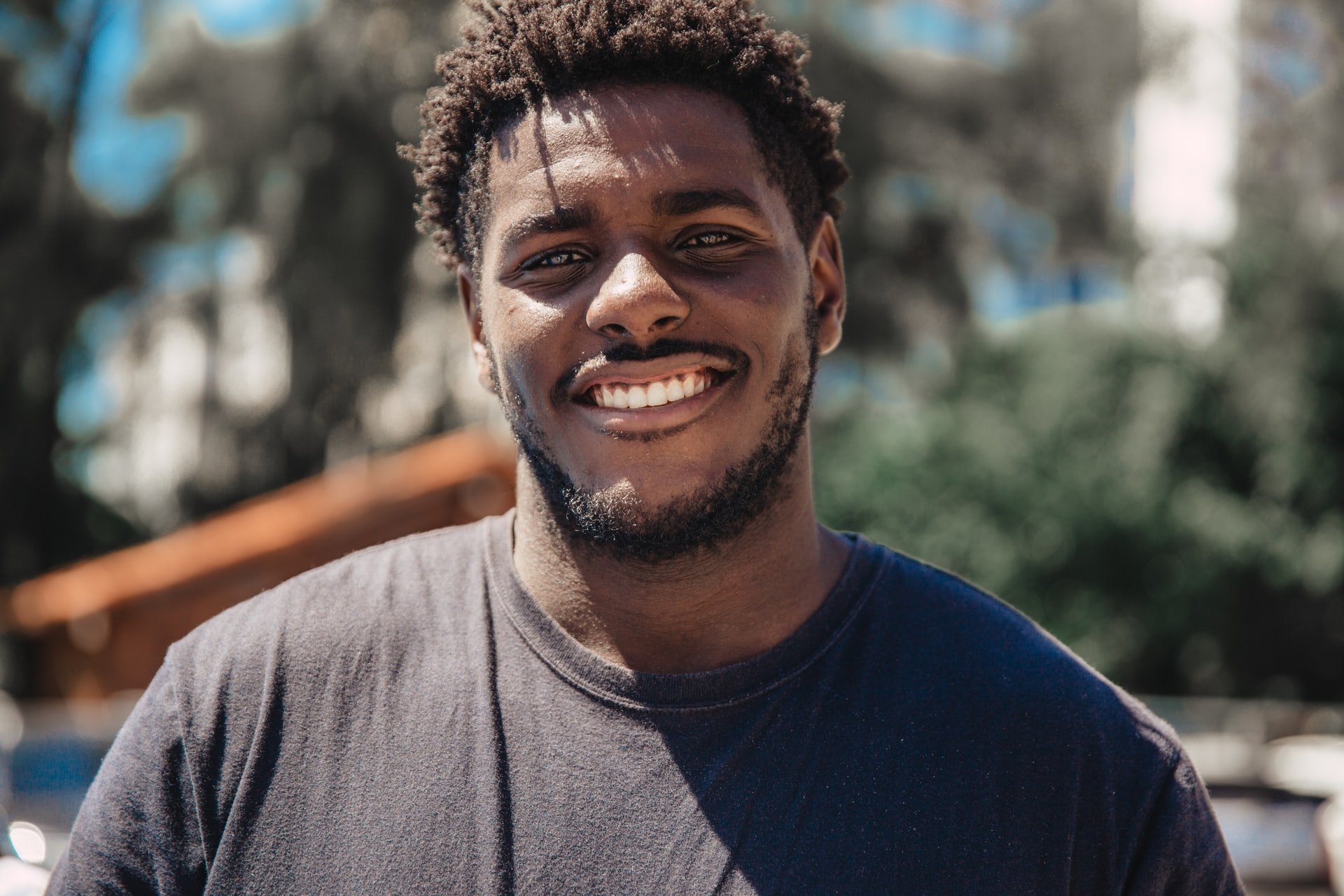 Young black man smiling