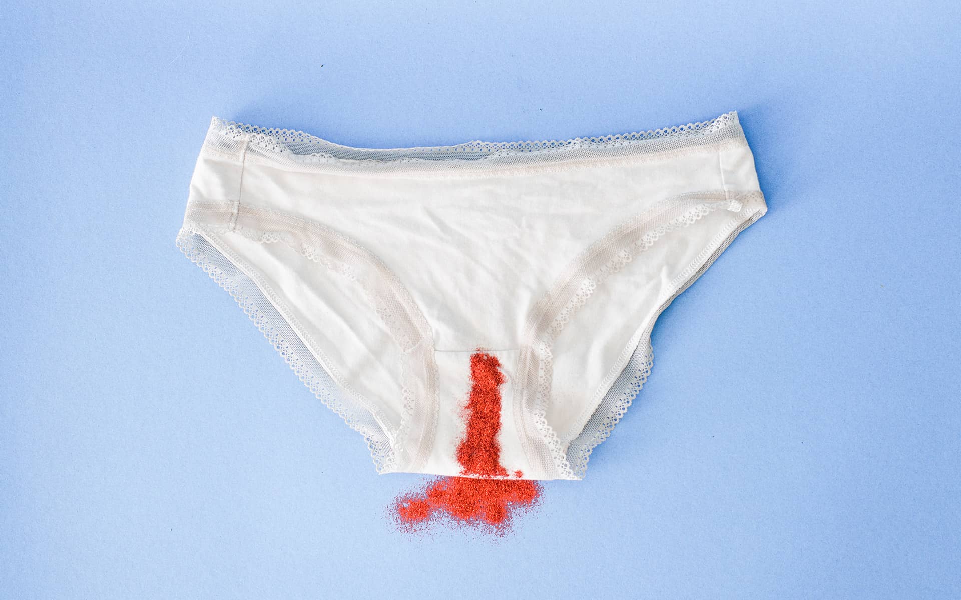 White underwear stained with chilli powder to resemble menstrual blood