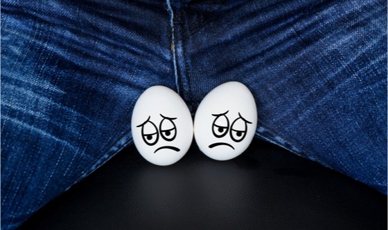 Sad-faced eggs representing testicles 