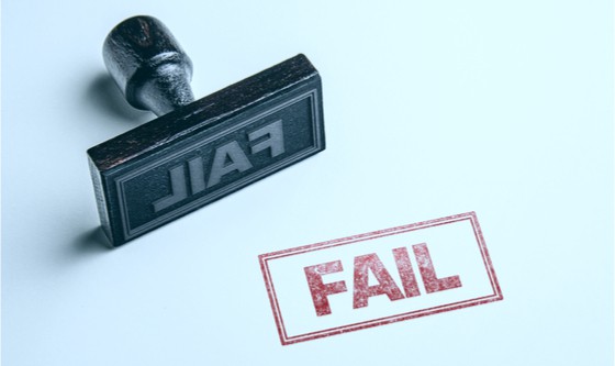 Rubber stamp with the word 'fail' on it