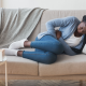 woman lying in a couch