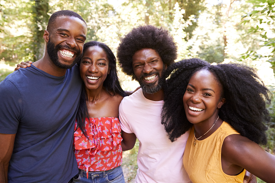 two men, two women smiling