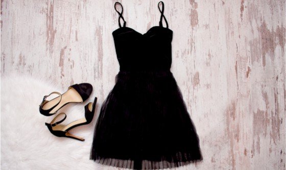 Little black dress and strappy sandals 