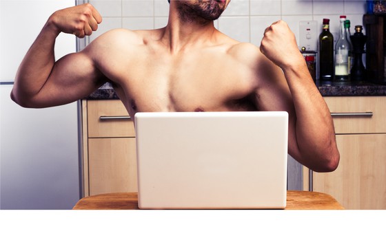 shirtless man flexing muscles to impress online date