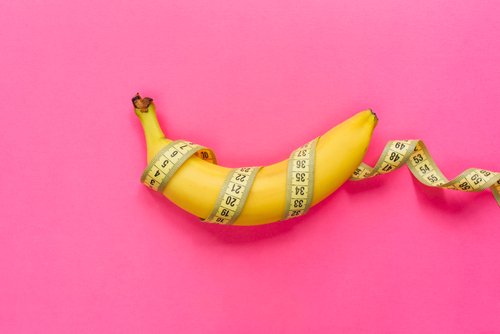 Ripe banana wrapped in tape measure