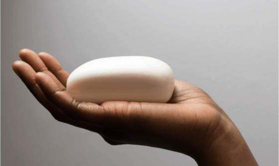 Image of hand holding soap