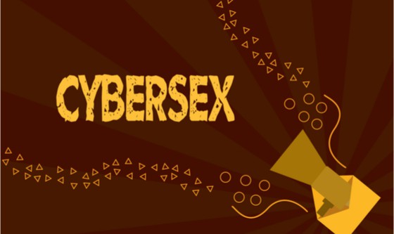 Yellow writing on brown background 'cybersex' 