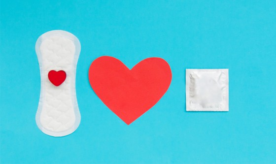 Sanitary pad, heart, and condom 