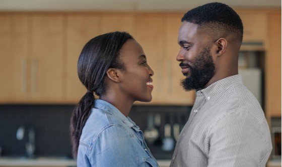 black man and woman looking lovingly at each other