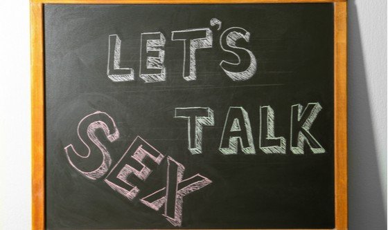 A blackboard with Let's Talk Sex written on it