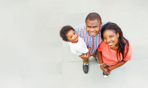 Small family with one child, seen from above 