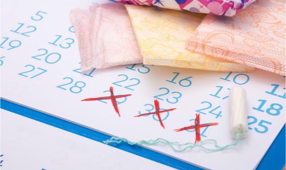 Menstruation calendar with cotton tampons and sanitary pads