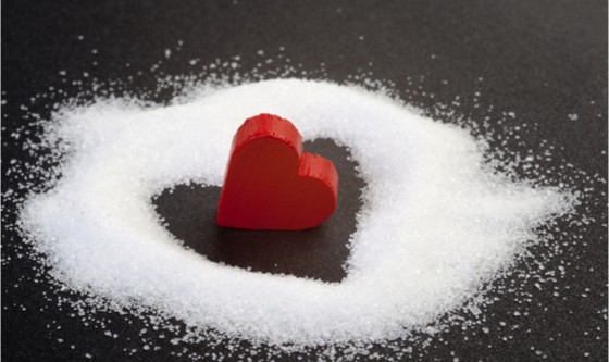 Red heart surrounded by sugar