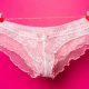 Pink female panties on clothesline